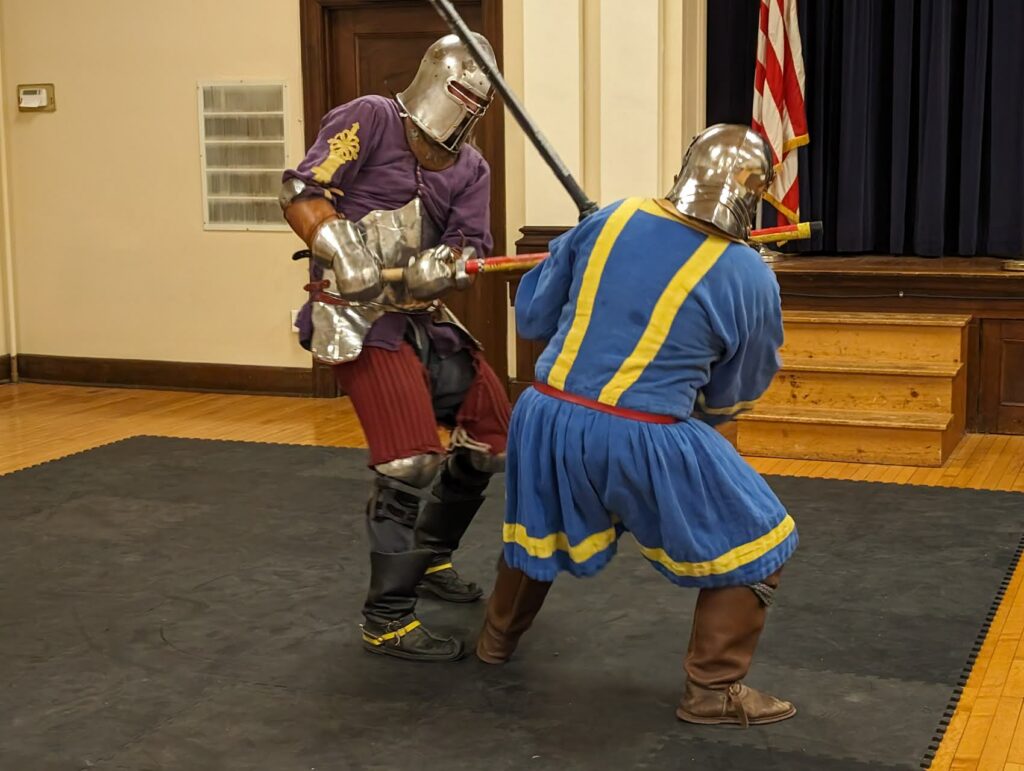 Hirsch and Melchor fighting with a hand and a half sword and great sword respectively.