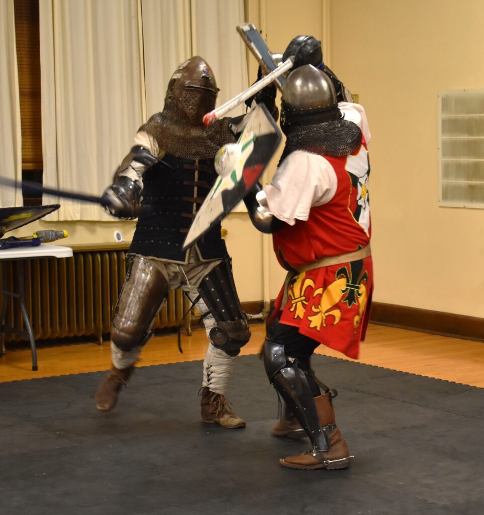 Aurik fights Sir Roger