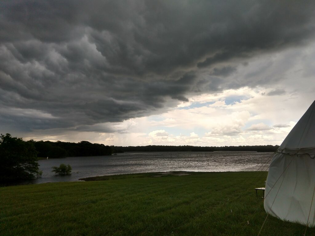 A storm rolls in over the lake at Lilies
